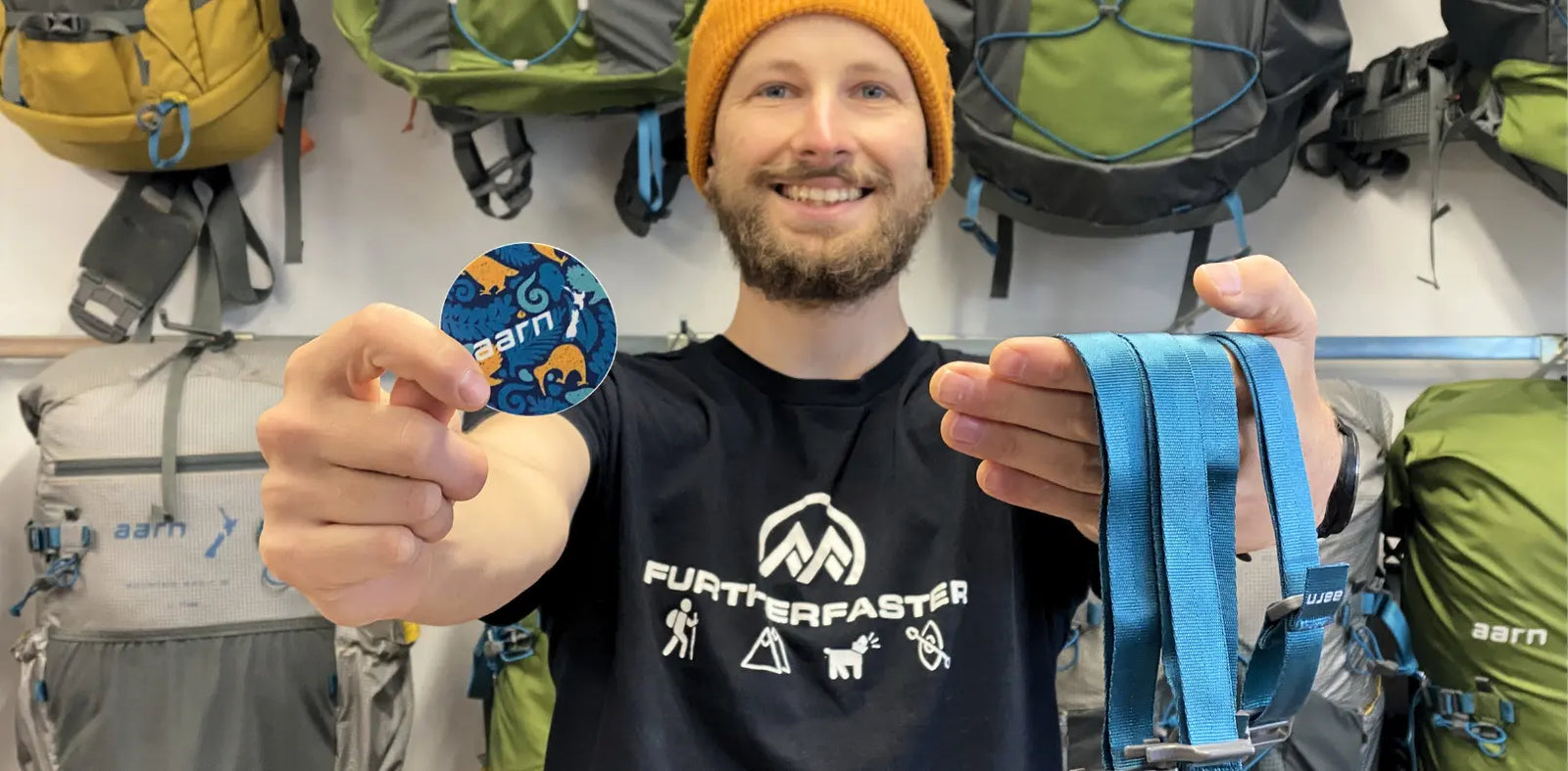 Man holding an Aarn Noso patch and Aarn Lasso Loc Straps