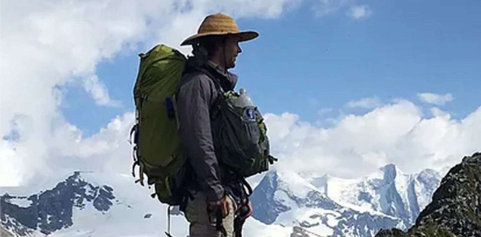 A man wearing a comfortable hiking pack by Aarn Packs in the Mountains